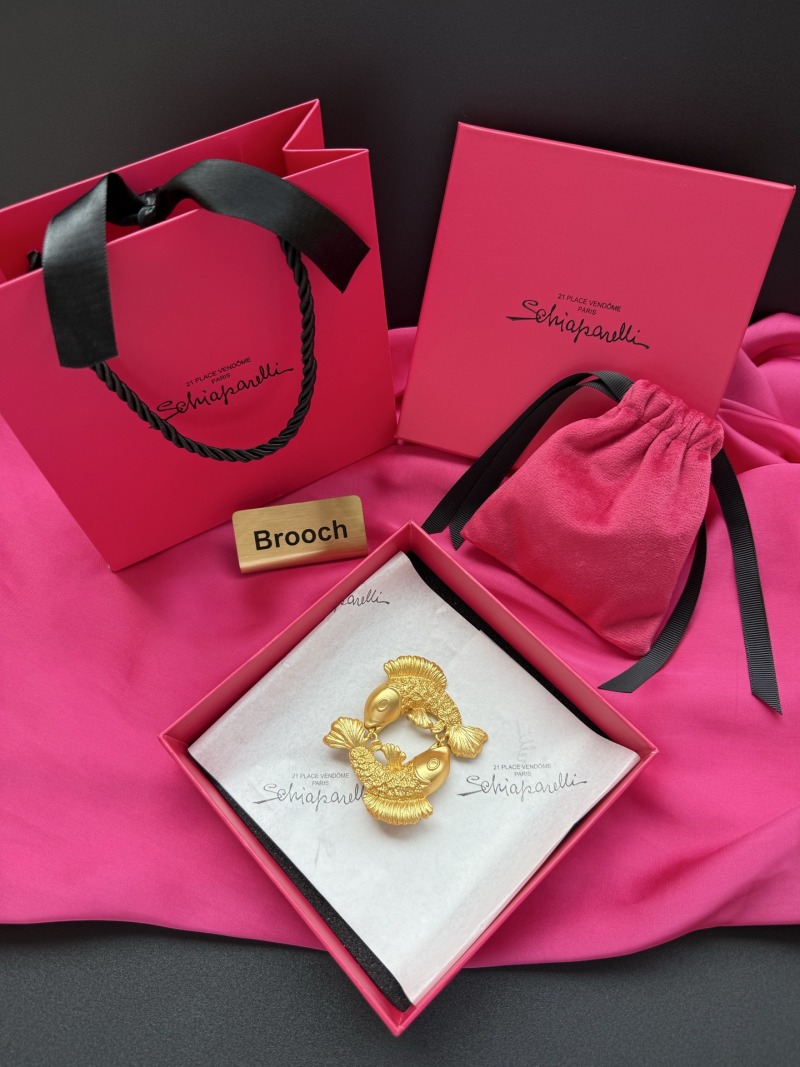 Брошь Schiaparelli в виде двух рыб