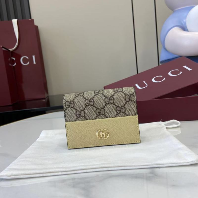 Портмоне Gucci с монограммой и логотипом GG
