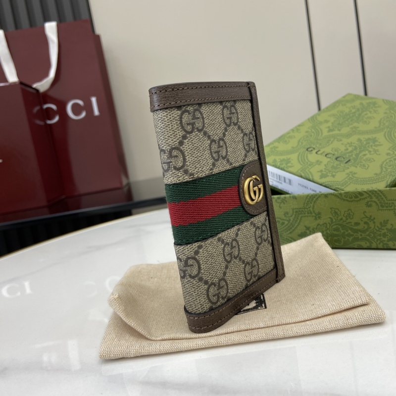 Портмоне Gucci с монограммой и пряжкой