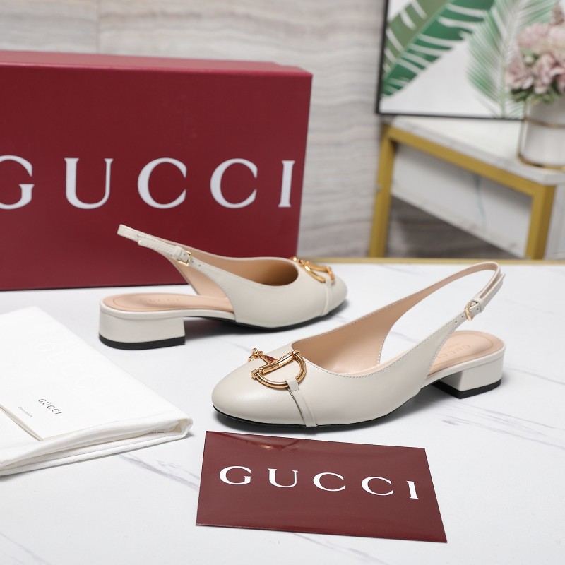 Женские сабо на каблуке с золотой застёжкой Gucci
