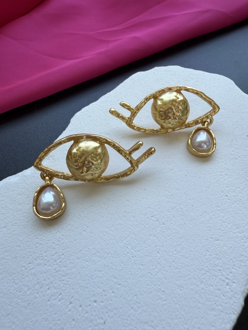 Серьги в форме глаз с жемчугом Schiaparelli