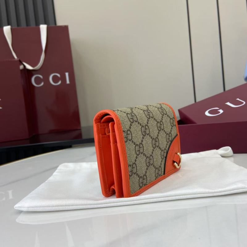 Портмоне Gucci с монограммой и оранжевой отделкой