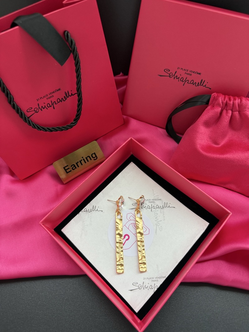 Серьги с кристаллами и золотистой подвеской Schiaparelli