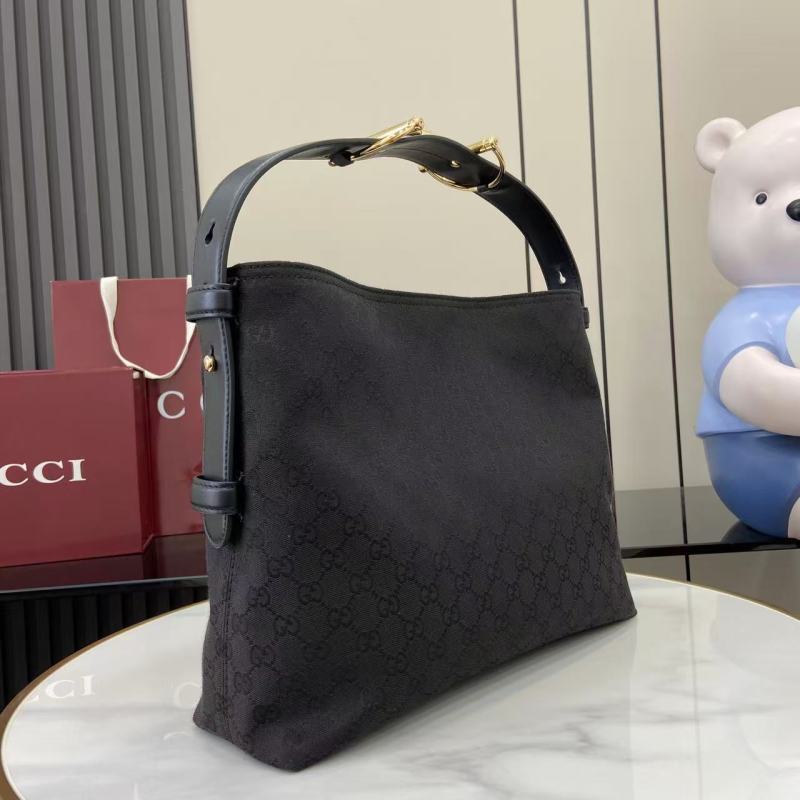 Сумка Gucci с монограммой и ручкой