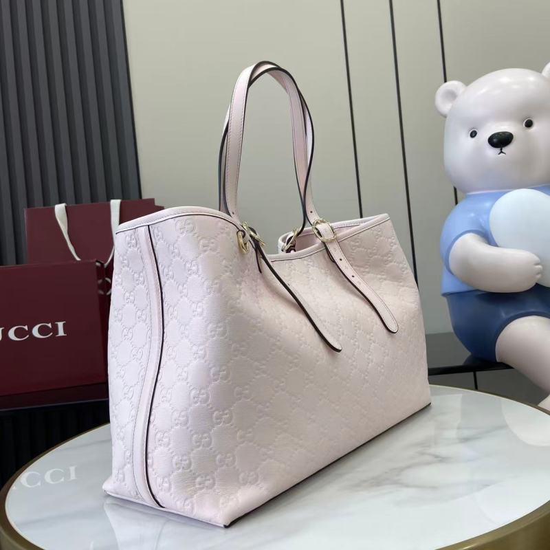 Сумка-тоут Gucci с тиснением GG