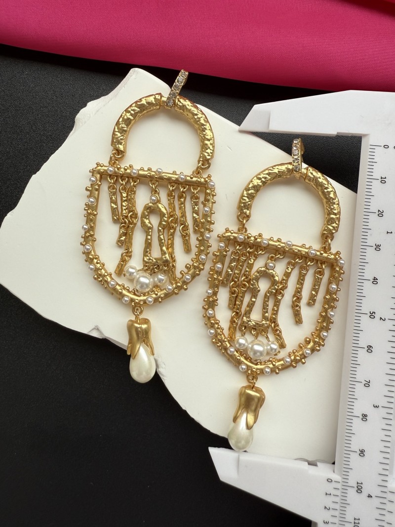Золотистые серьги с жемчугом и кисточками Schiaparelli
