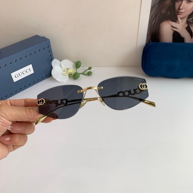 Солнцезащитные очки Gucci без оправы, золотистый декор
