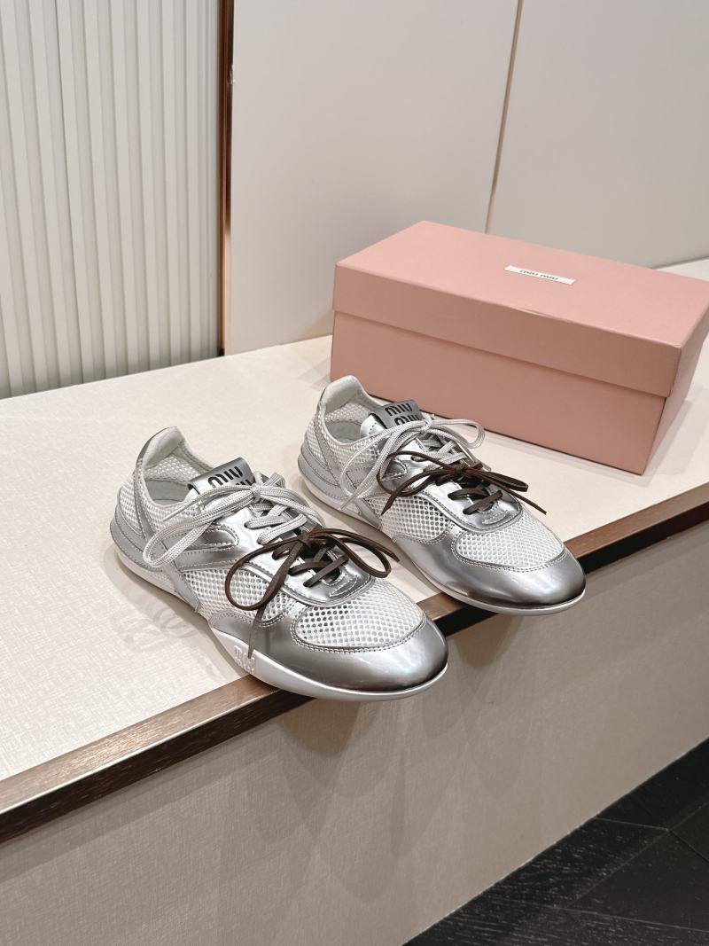 Кроссовки Miu Miu серебристые женские