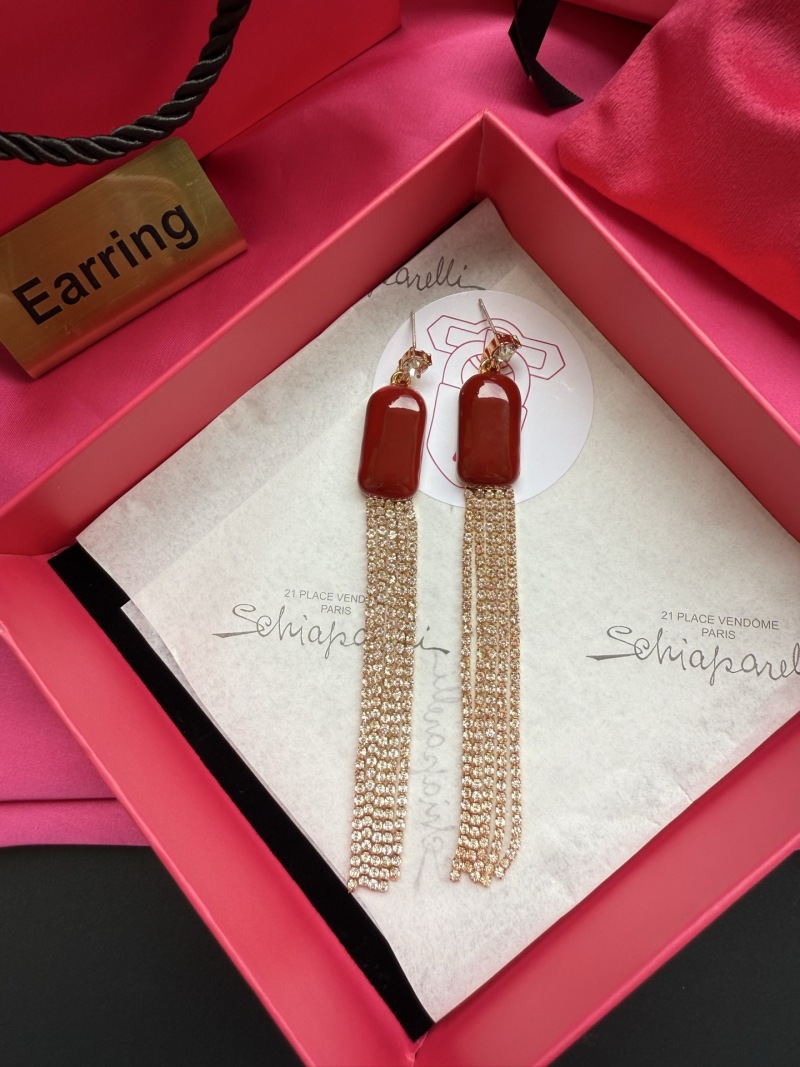 Серьги с цепочками Schiaparelli