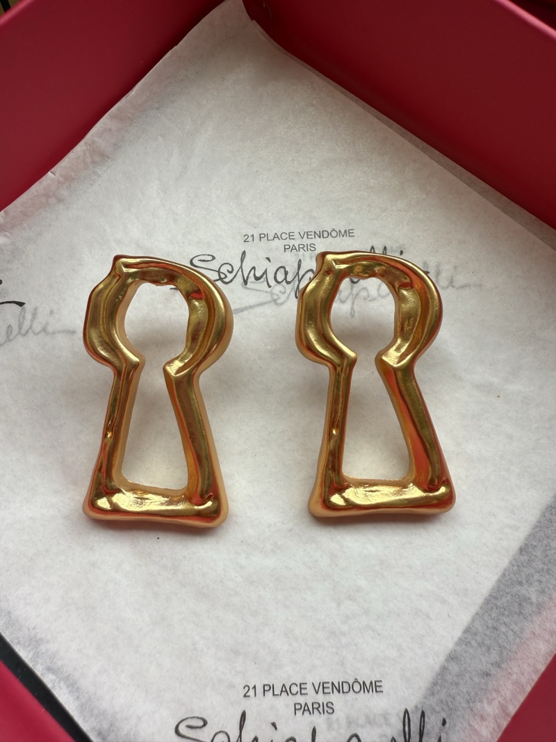 Серьги в форме ключа Schiaparelli