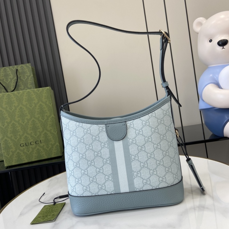 Сумка Gucci с монограммой и кожаной отделкой