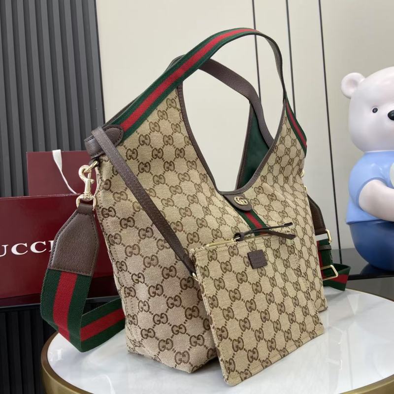 Сумка Gucci с принтом GG и кошельком