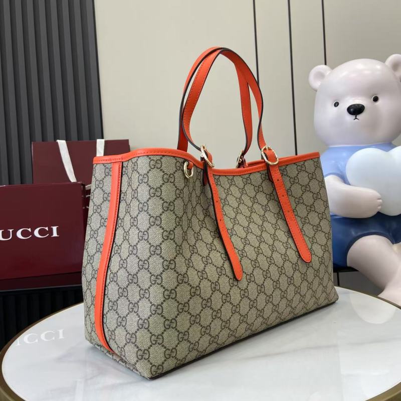 Сумка-тоут Gucci с принтом GG и оранжевыми вставка