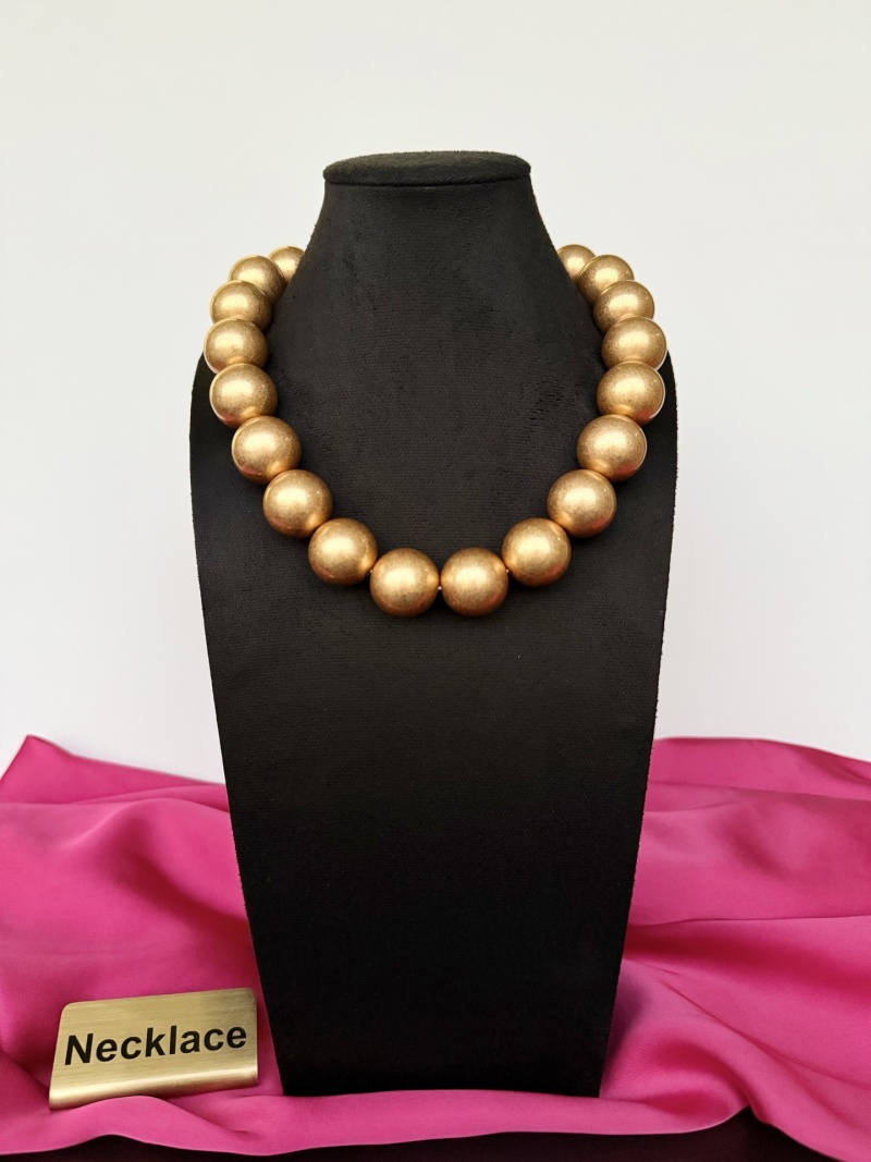 Колье из золотистых бусин Schiaparelli