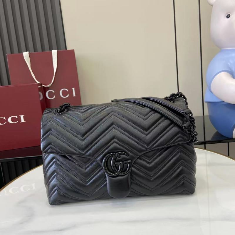 Черная сумка Gucci с кисточкой