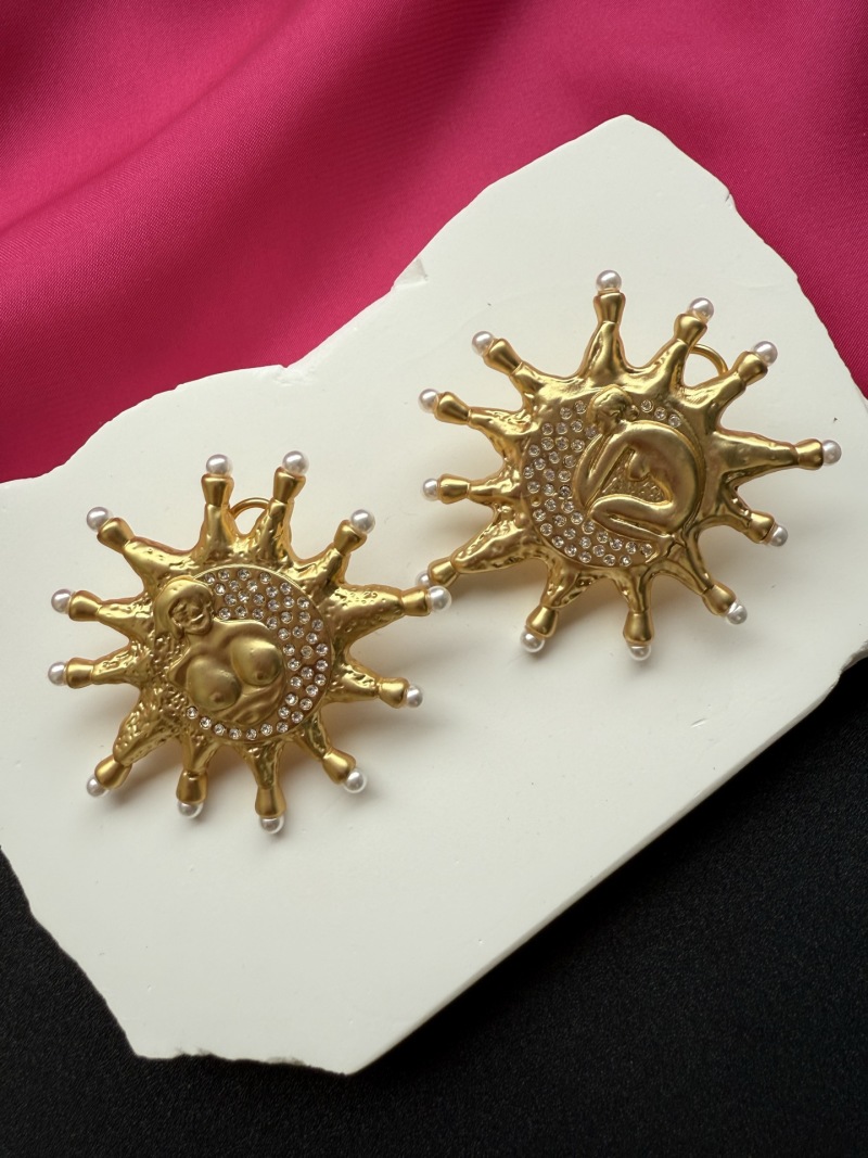 Серьги в виде солнца с кристаллами Schiaparelli