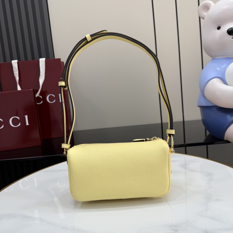 Желтая сумка-клатч Gucci с ремешком