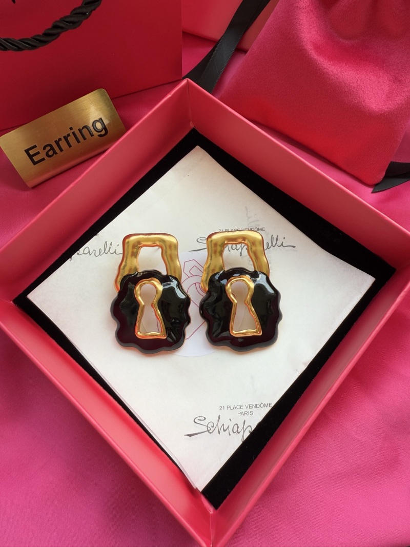 Серьги в виде замков Schiaparelli