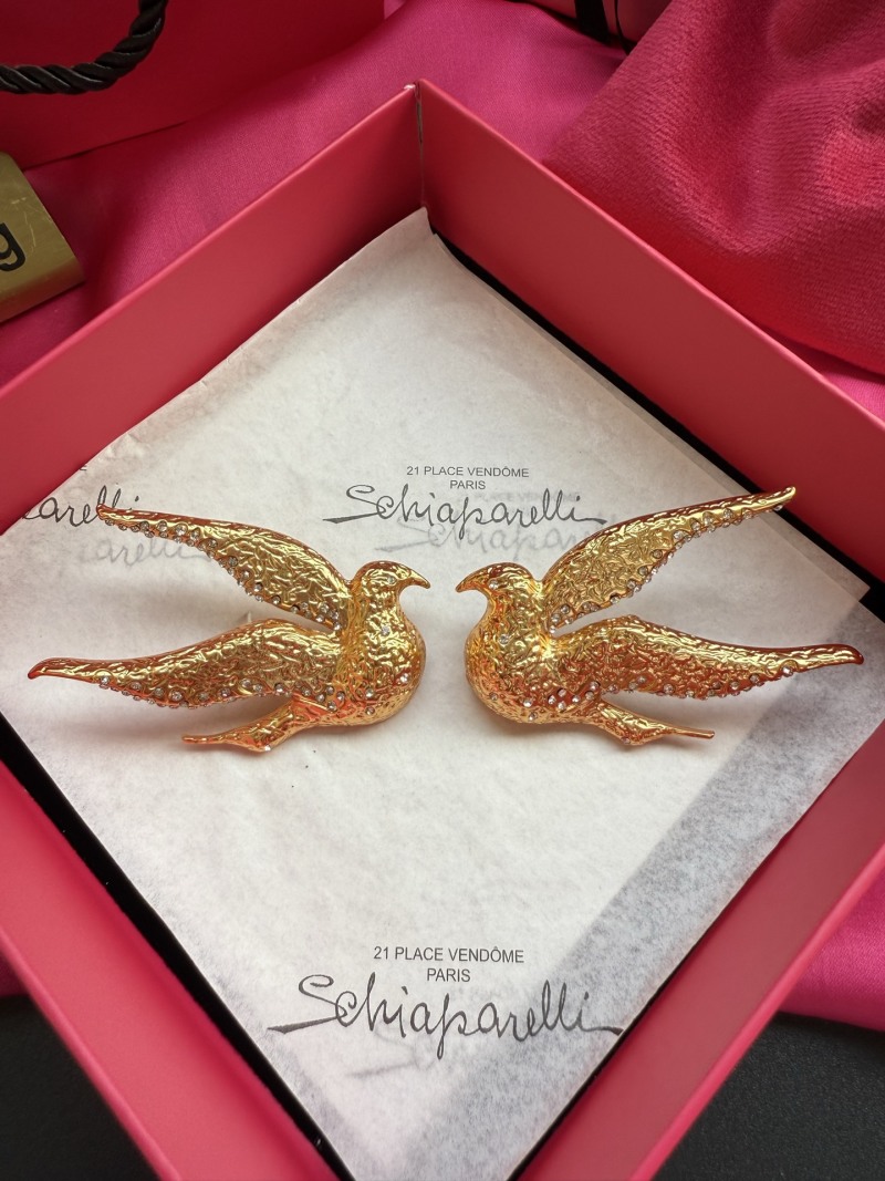 Брошь в виде двух птиц Schiaparelli