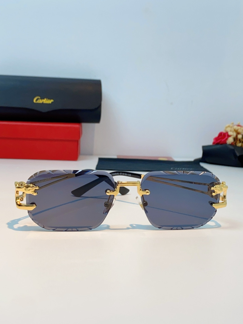 Солнечные очки Cartier в золотой оправе