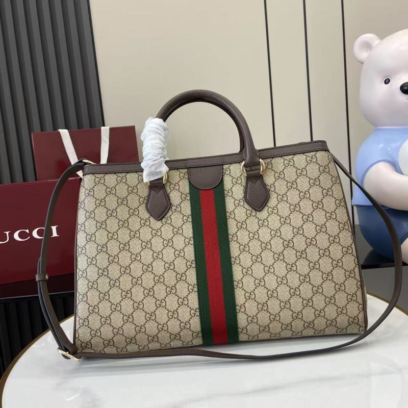 Сумка Gucci с монограммой и полосой