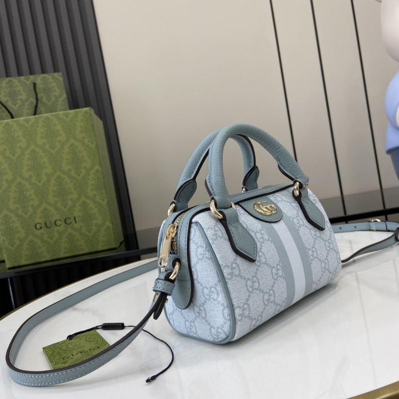 Сумка Gucci с монограммой и ручкой