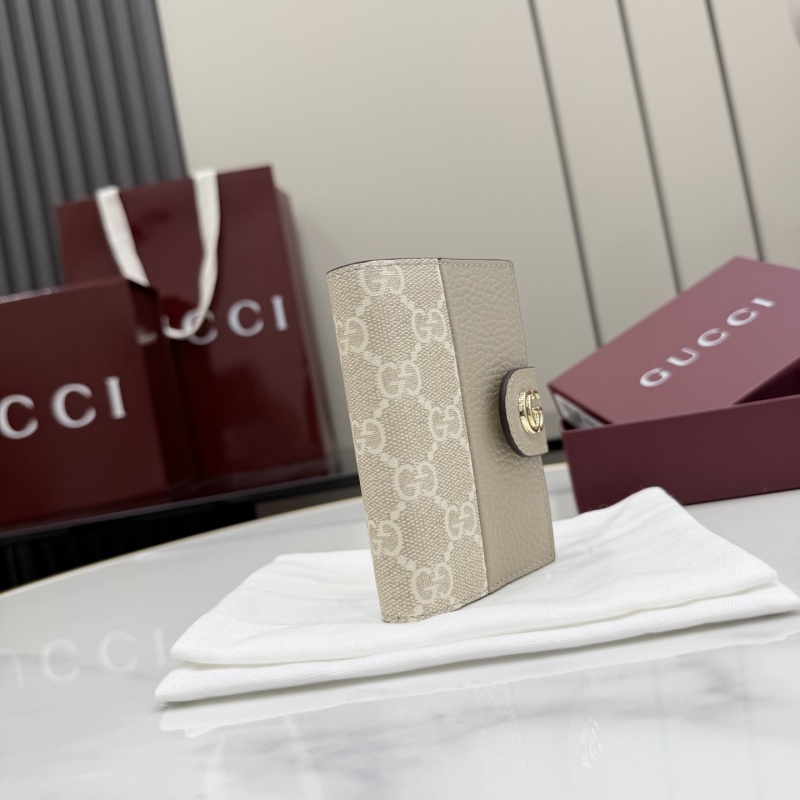 Портмоне Gucci с монограммой и пряжкой
