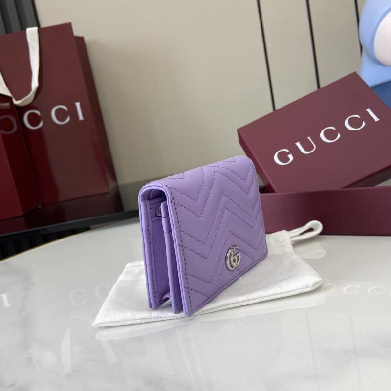 Фиолетовый кошелёк Gucci с логотипом