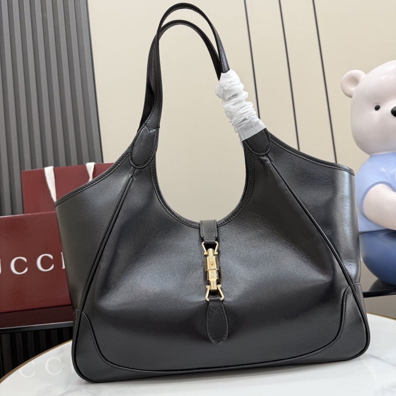 Черная кожаная сумка Gucci с замком