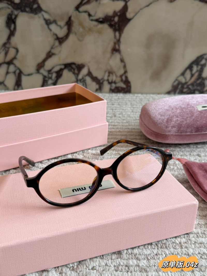 Очки Miu Miu круглые в роговой оправе