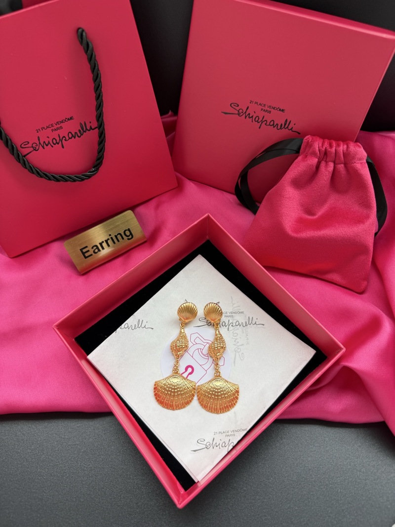 Золотистые серьги в виде ракушек Schiaparelli