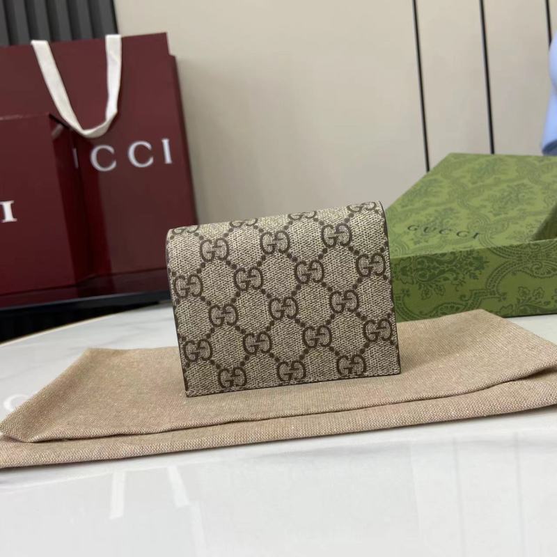 Портмоне Gucci с монограммой и логотипом GG