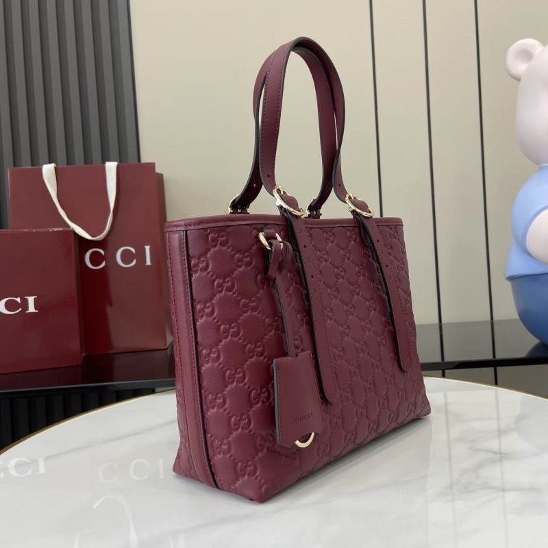 Сумка-тоут Gucci бордовая с тиснением