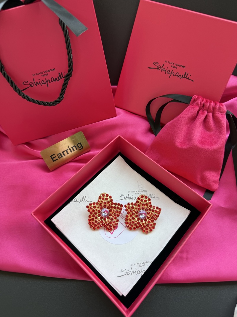 Серьги-цветы с красными кристаллами Schiaparelli