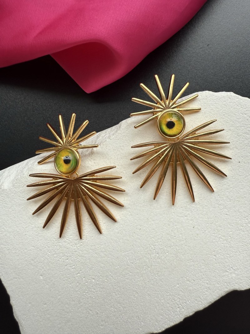Серьги Schiaparelli с золотистым металлом и желтыми стеклянными глазами