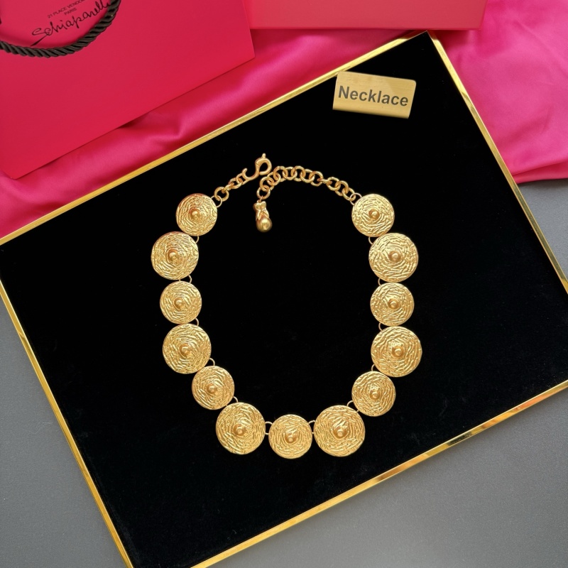 Золотистое колье с декоративными дисками Schiaparelli