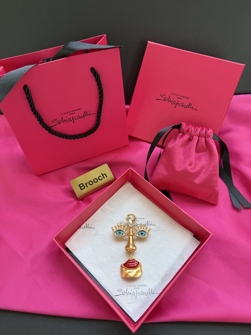 Брошь Schiaparelli