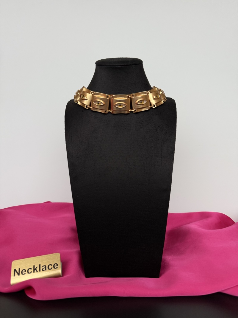Золотистое колье с глазами Schiaparelli