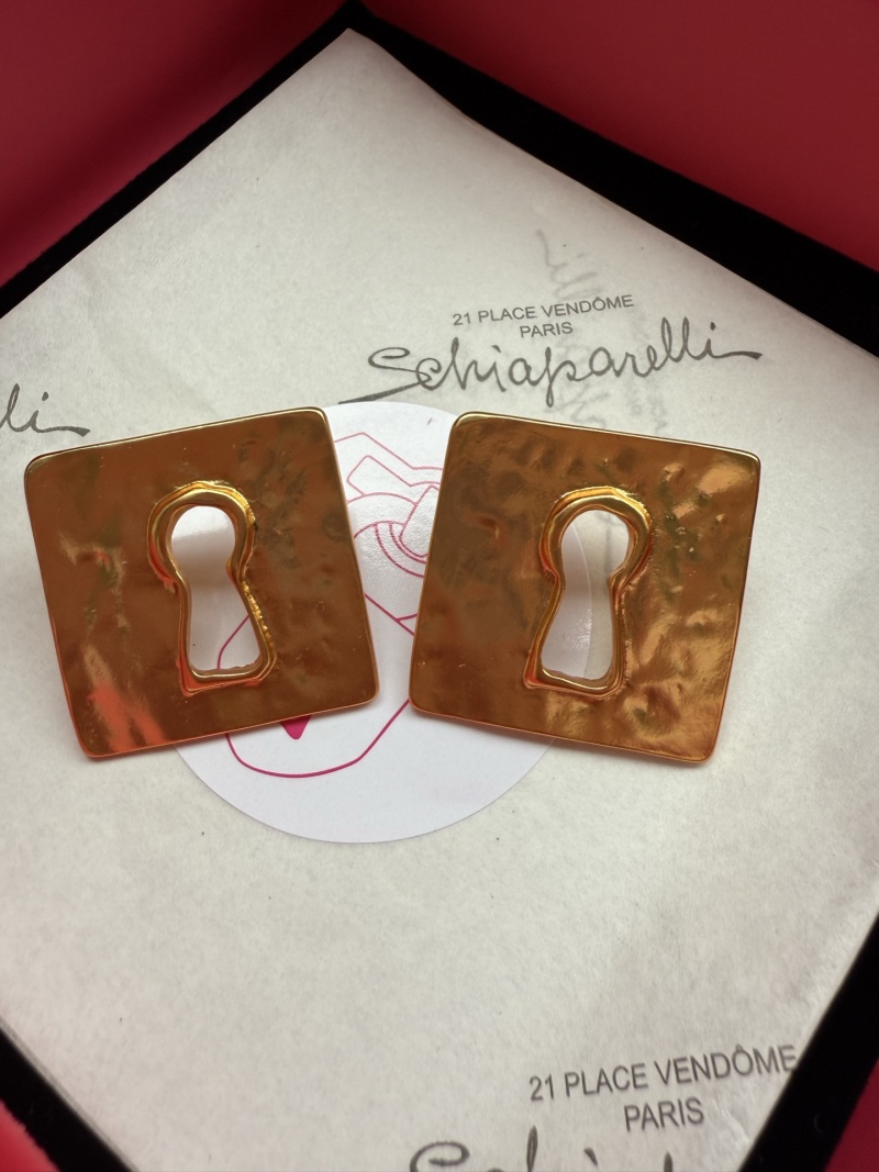Серьги в виде ключевых отверстий Schiaparelli