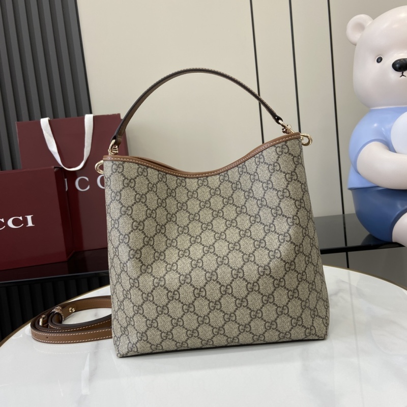 Сумка Gucci с монограммой и кожаной отделкой