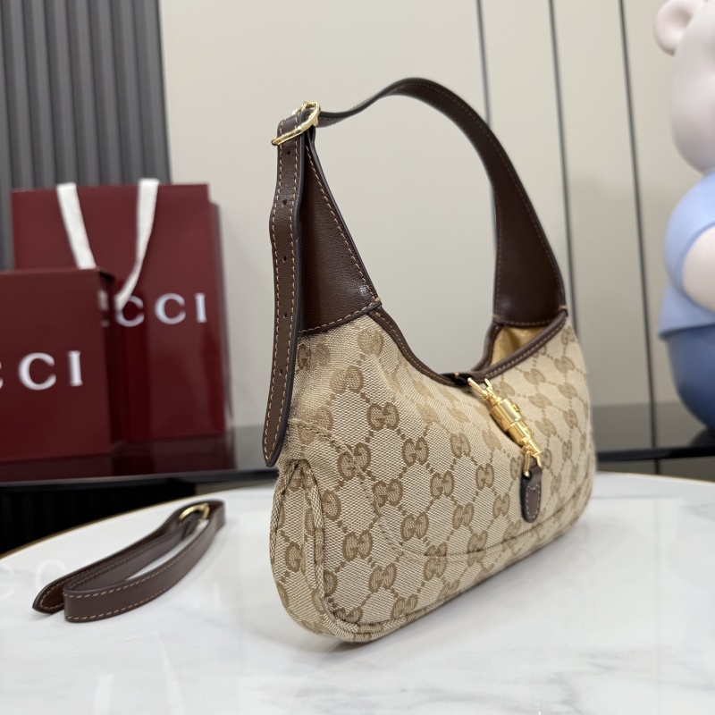 Сумка Gucci с монограммой и замком