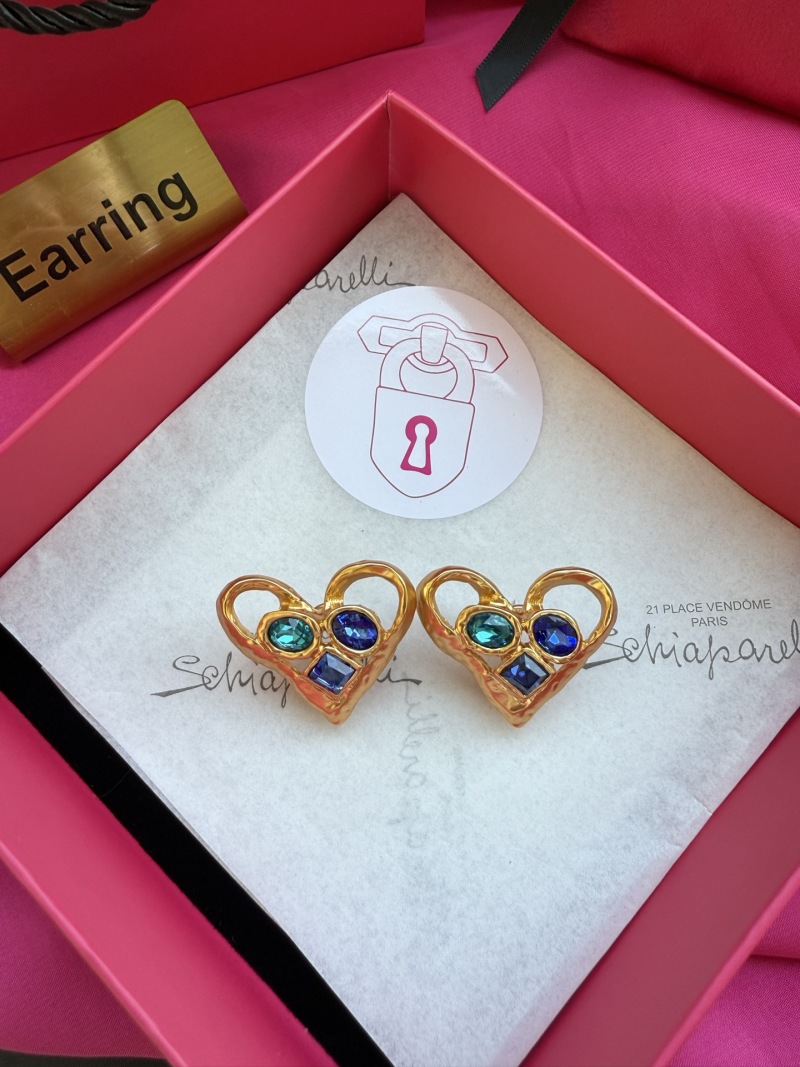 Серьги в форме сердца с камнями Schiaparelli