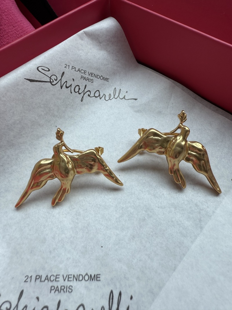 Серьги Schiaparelli в виде фигур