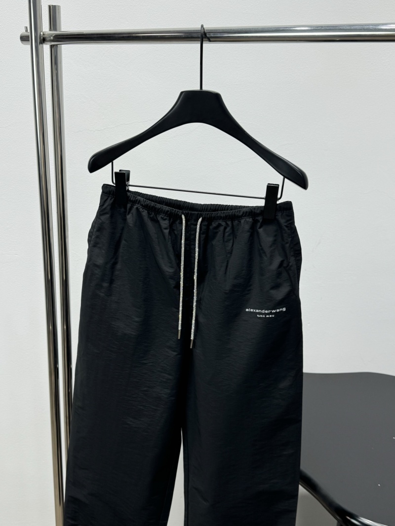 Черные брюки с логотипом Alexander Wang и декоративными шнурками
