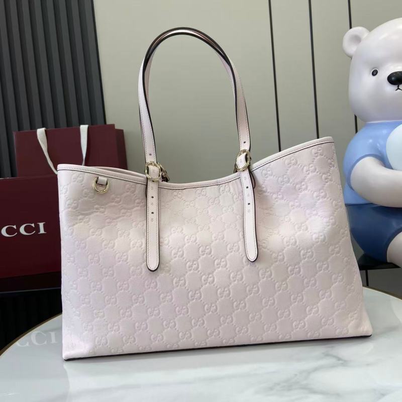 Сумка-тоут Gucci с тиснением GG
