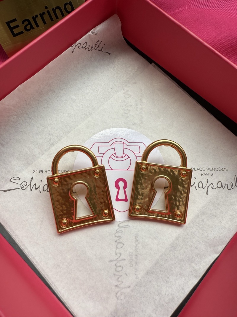 Серьги в виде замков Schiaparelli