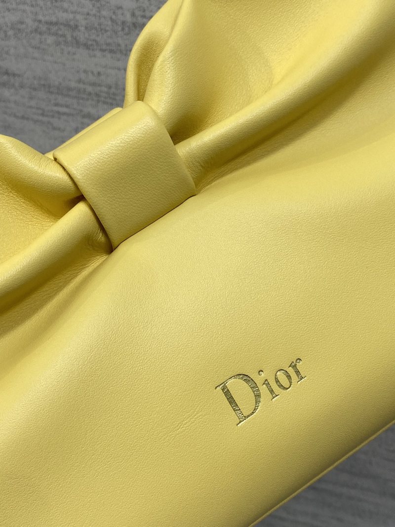 Желтая сумка Dior с бантом