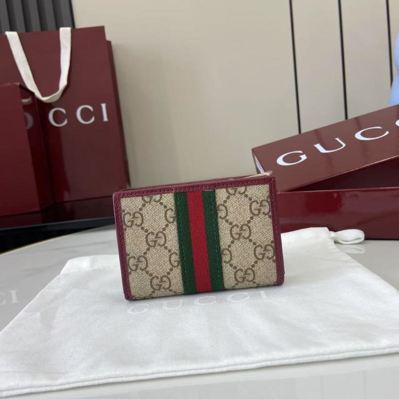 Кошелёк Gucci с монограммой и молнией
