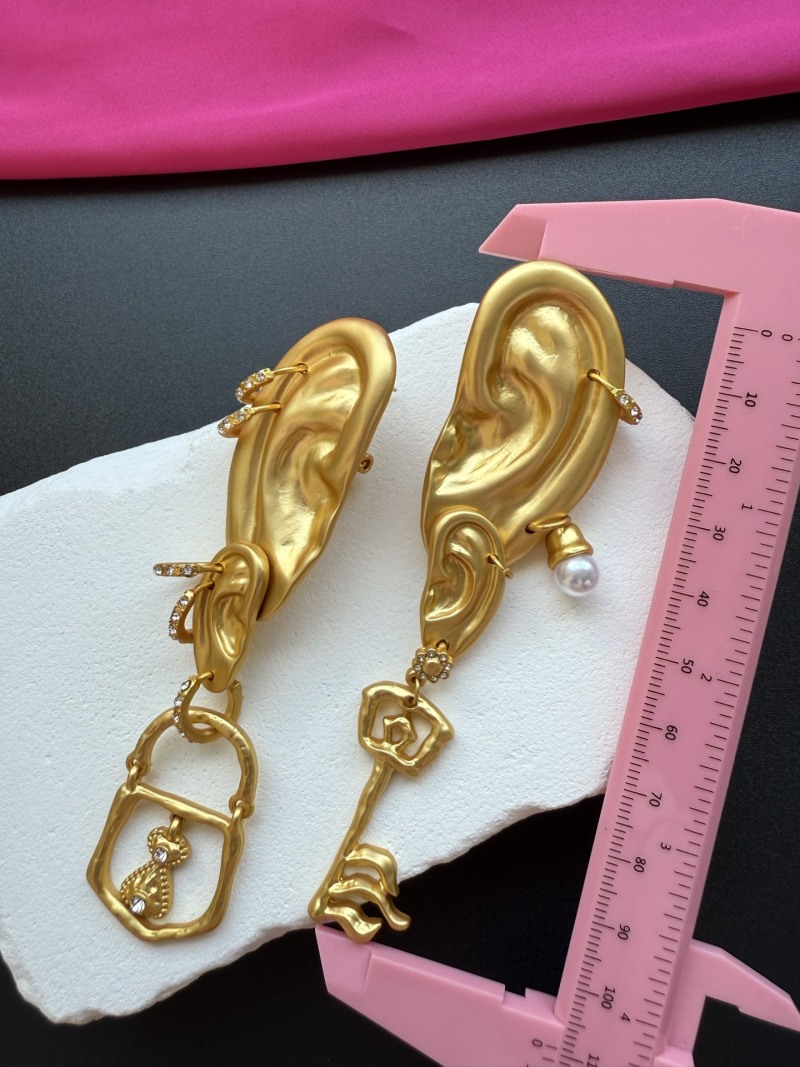 Серьги в форме уха с ключом и замком Schiaparelli