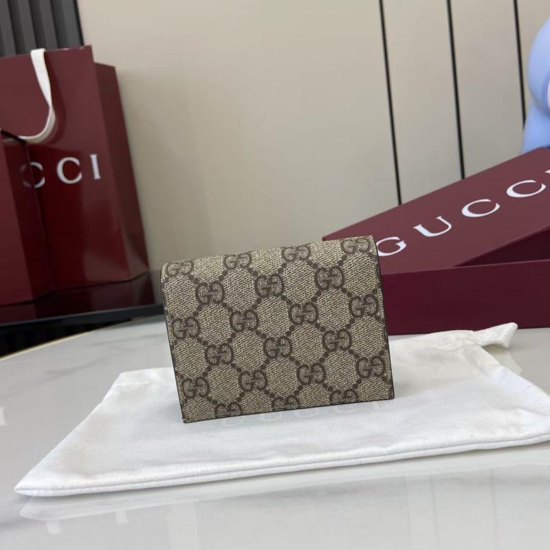Портмоне Gucci с монограммой и логотипом GG